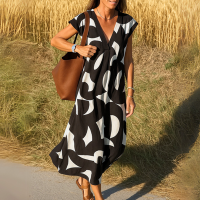 Maire | V‑aukkoinen mekko